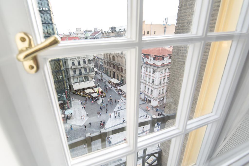 Merchants Crown Suites And Spa Praha Bagian luar foto View from the window of a room at the hotel