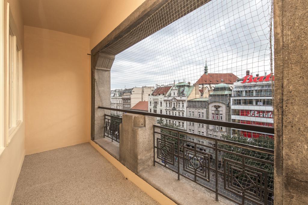 Merchants Crown Suites And Spa Praha Bagian luar foto A balcony in Vienna